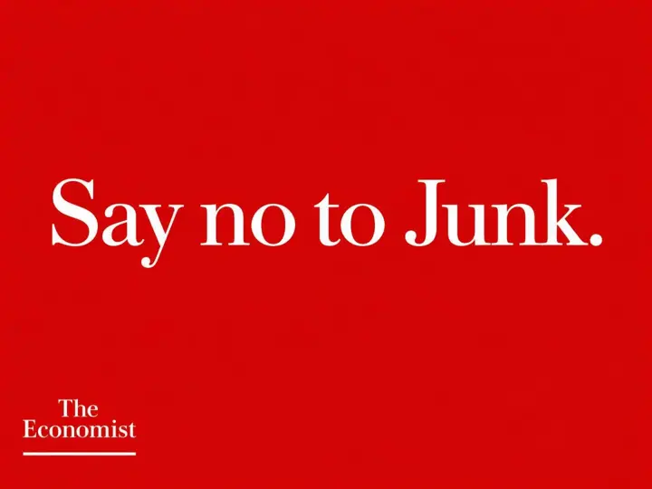 Red poster with white serif text “Say no to Junk.”